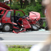 red-vehicle-hits-a-pole