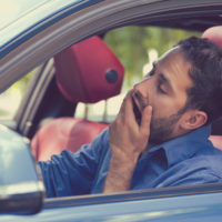 Man driving drowsy Man driving drowsy