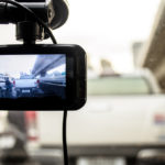 The image of camera on dashboard of car